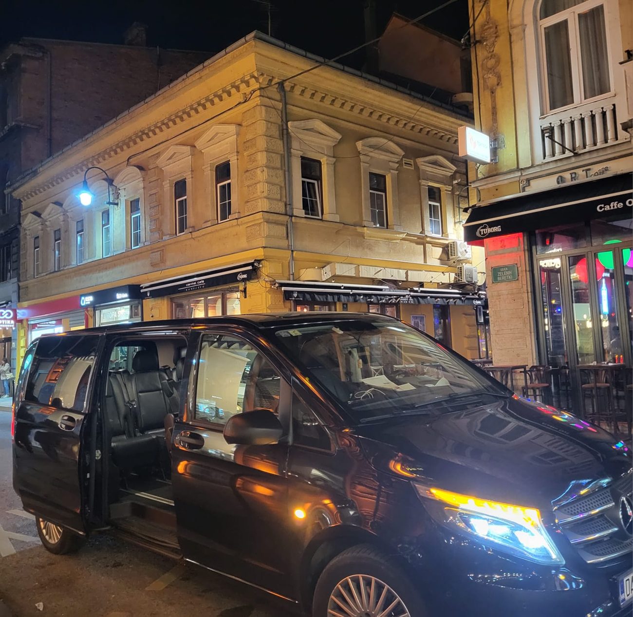 Transfer van in the city at night